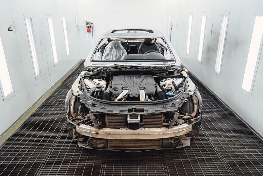 Unibody frame exposed after panel removal during collision repair service